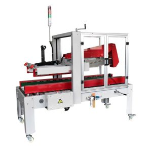 Scotcheuse carton automatique RUBBER avec dispositif de fermeture des rabats rouge sous carter transparent